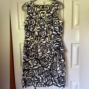 Women’s black and white peplum dress with lime detail, size 14, like new